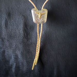 Bolo steer brass on silver